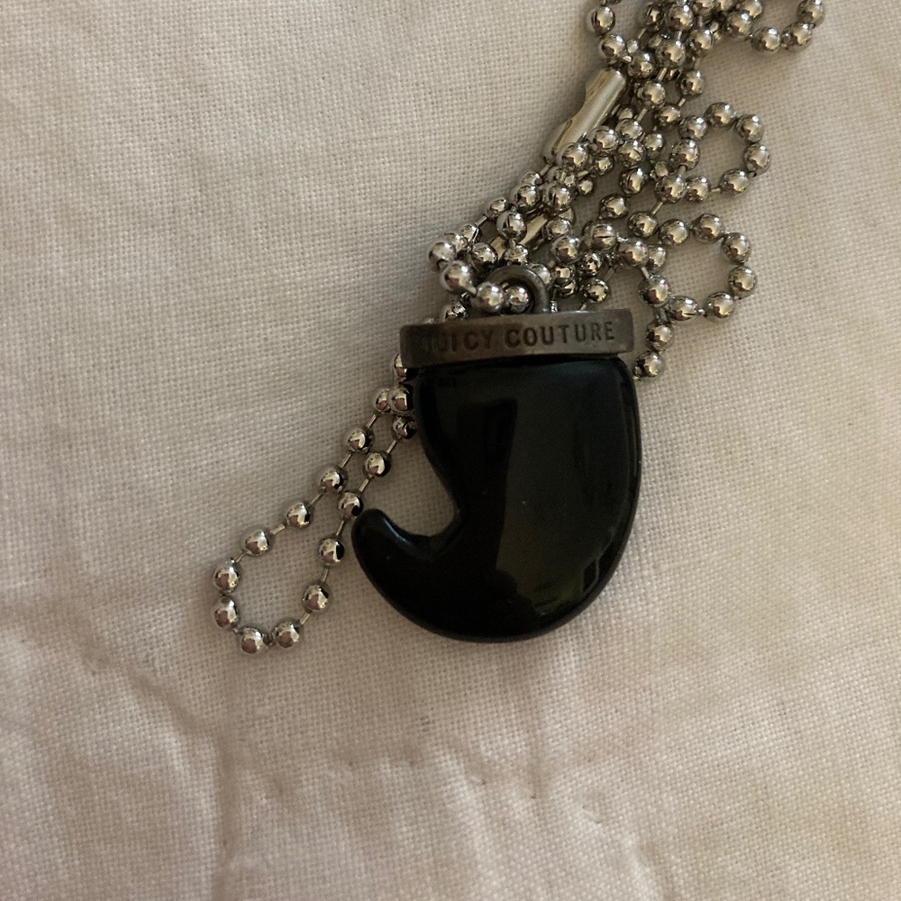 Juicy couture black tooth charm